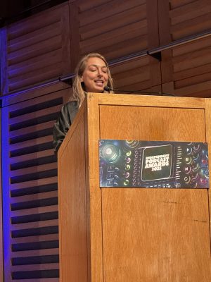 Nina Robinson presenting at the Independent Podcast Awards